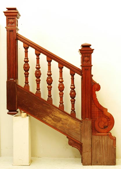 Mahogany_newel_post_and_staircase_late_19th_century.jpg