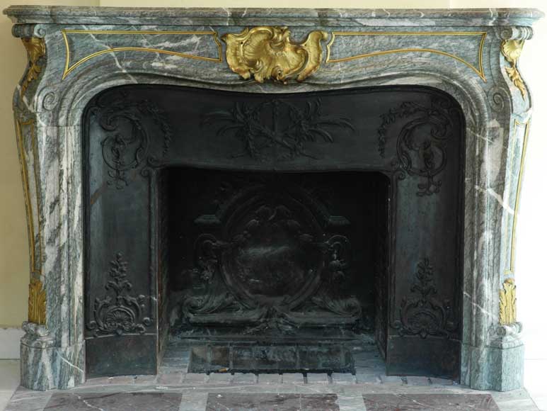 Campan_vert_marble_fireplace_mantel_Louis_XV_style_with_cast_iron_insert.jpg