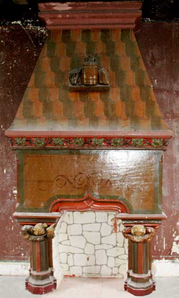 Painted_stone_mantel_adorned_with_picturesque_characters.jpg