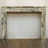 Cheminée Louis XVI en marbre brèche violette