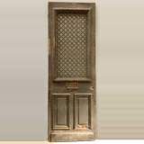 Porte en pin avec grille en fonte