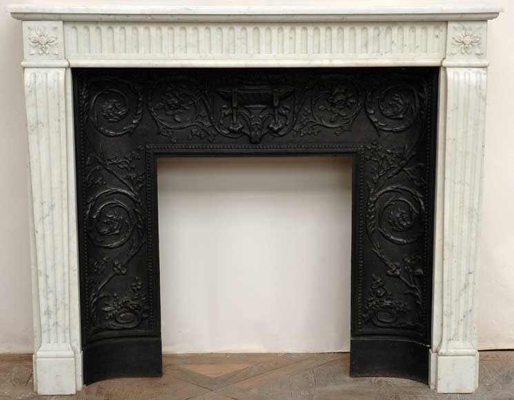 Louis_XVI_style_Carrara_marble_mantel_with_pilaster_jambs.jpg