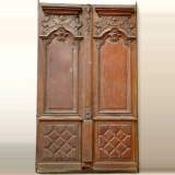 Porte double en chêne à coquilles