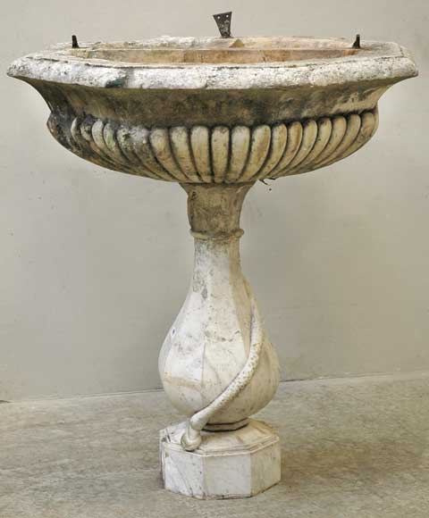 Marble_stoup_with_snake_and_apple.jpg