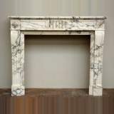 Cheminée Louis XVI en marbre blanc à cannelures 