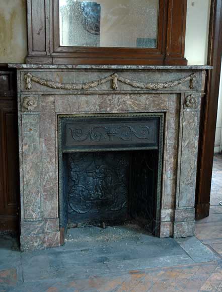 Marble_mantel_with_laurel_leaf_swags.jpg