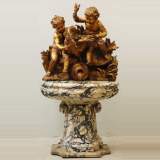 Fontaine de jardin doré avec putti et cygne