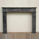 Cheminée du XIXè siècle en marbre gris Turquin à gravures