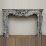 Cheminée de style Louis XV en marbre Bleu Fleuri