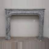 Cheminée ancienne de style Louis XIV en marbre Bleu Fleuri