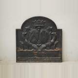 Plaque de cheminée en fonte à double armoiries