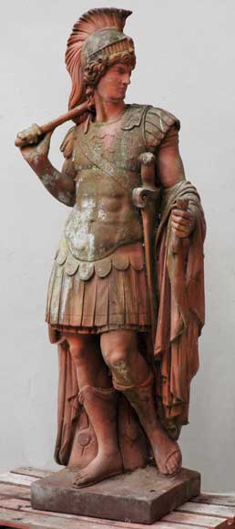Cast_stone_statue_of_soldier_with_terra_cotta_patina.jpg