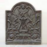 Plaque de cheminée à la lyre