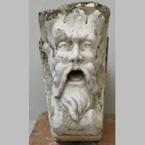 Clef de voûte à mascaron d'homme