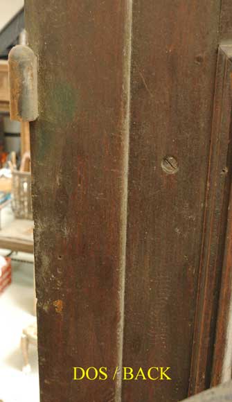 Porte monumentale à deux vantaux à décor fantastique. Porte monumentale à deux vantaux à décor fantastique.-13