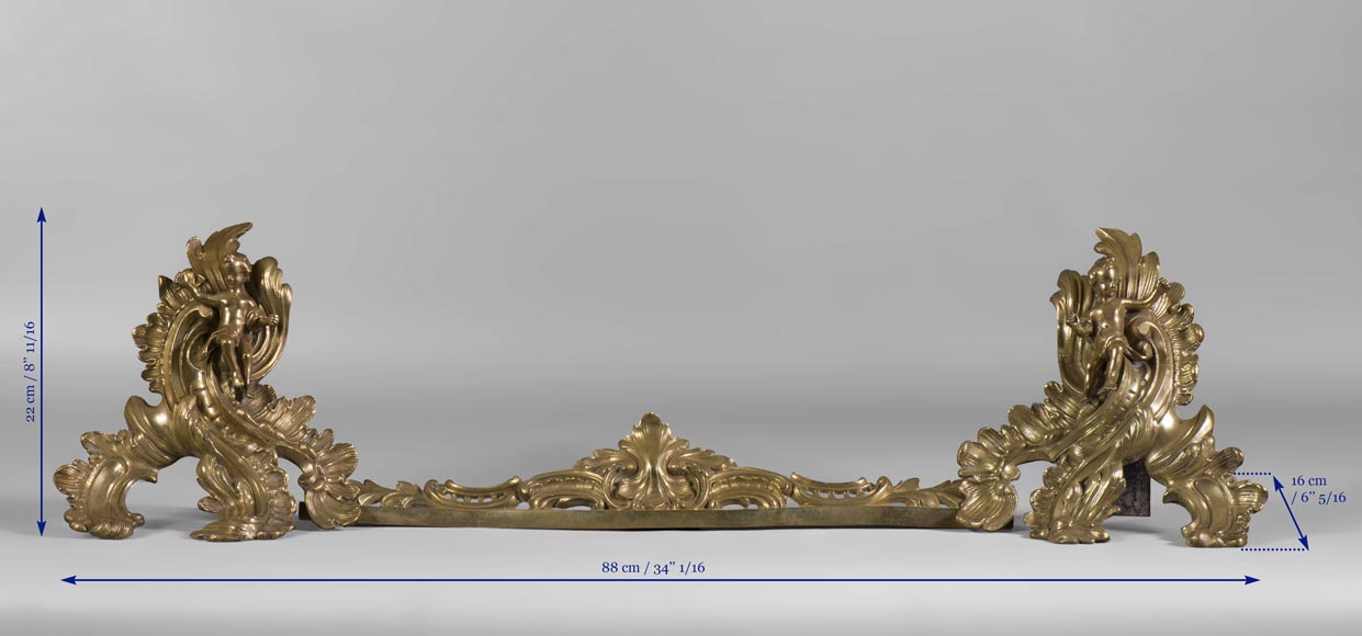Belle barre de chenets de style Louis XV en bronze doré avec enfants et feuillages Belle barre de chenets de style Louis XV en bronze doré avec enfants et feuillages-6