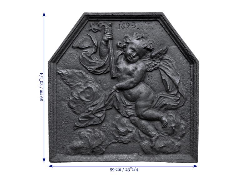 Plaque de cheminée ancienne datée 1693 au putto ailé tenant une torche Plaque de cheminée ancienne datée 1693 au putto ailé tenant une torche-5