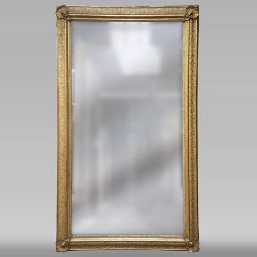 Trumeau ancien doré d'époque Restauration à décor de coquilles