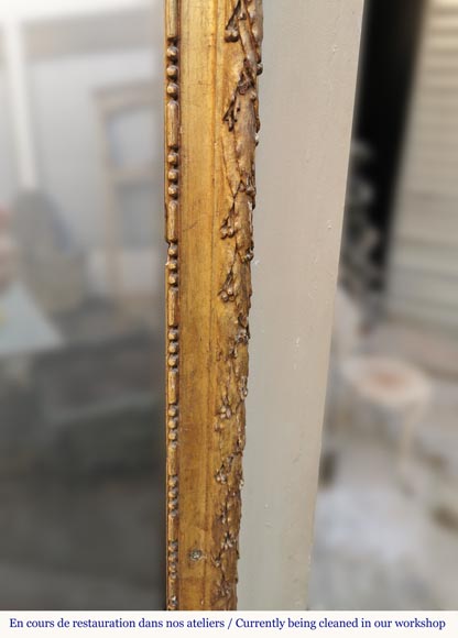 Trumeau en bois doré d'époque Louis XVI à la double couronne de fleurs et branches d'olivier Trumeau en bois doré d'époque Louis XVI à la double couronne de fleurs et branches d'olivier-5