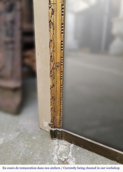 Trumeau en bois doré d'époque Louis XVI à la double couronne de fleurs et branches d'olivier Trumeau en bois doré d'époque Louis XVI à la double couronne de fleurs et branches d'olivier-6