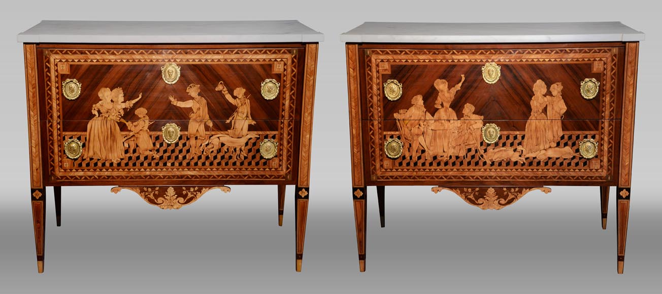 Giuseppe MAGGIOLINI (1738 – 1814)(Entourage de),Remarquable paire de commodes néoclassiques à décor de marqueterie présentant un « Départ pour la chasse » et un « Retour de la chasse », début du XIXe siècle Giuseppe MAGGIOLINI (1738 – 1814)(Entourage de),Remarquable paire de commodes néoclassiques à décor de marqueterie présentant un « Départ pour la chasse » et un « Retour de la chasse », début du XIXe siècle-0