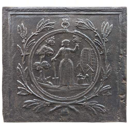Plaque de cheminée avec médaillon représentant une bergère