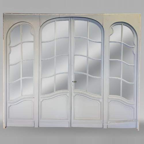 Grande double porte et encadrement vitrés