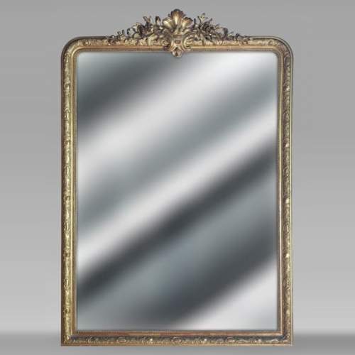 Grand trumeau doré de style Régence surmonté d'une palmette