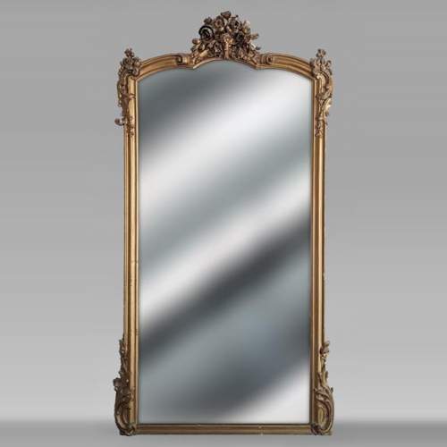 Trumeau de style Napoléon décoré d'un bouquet de fleurs, peinture doré