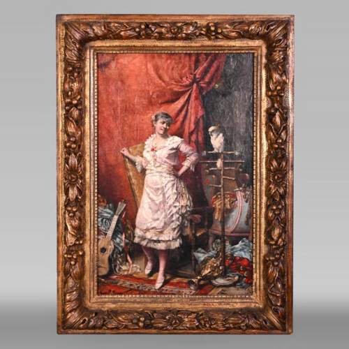 Jeune femme au cacatoès — Peinture de Joseph Henri CONDAMIN