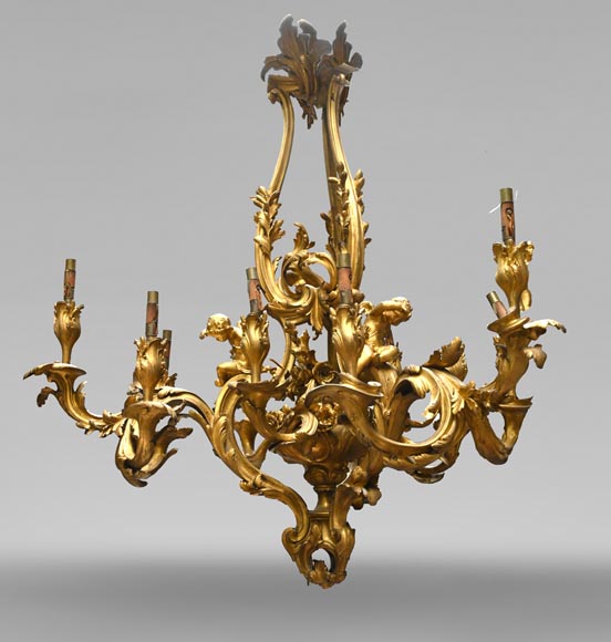 CAFFIERI (d'après). Exceptionnel lustre en bronze de style Louis XV CAFFIERI (d'après). Exceptionnel lustre en bronze de style Louis XV-0