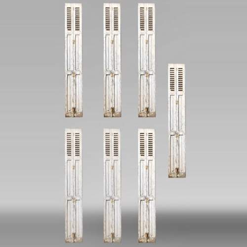 7 paires de volets anciens à persiennes fixes