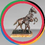 Sculpture d'un dresseur et son cheval, régule à patine brune