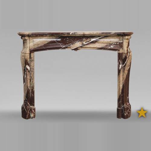 Cheminée ancienne de style Louis XV en marbre de Campan Rubané