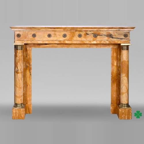 Cheminée de style Empire en marbre Jaune de Sienne à colonnes et rosaces en bronze doré