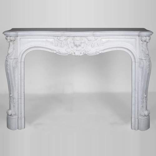 Cheminée de style Louis XV en marbre de Carrare