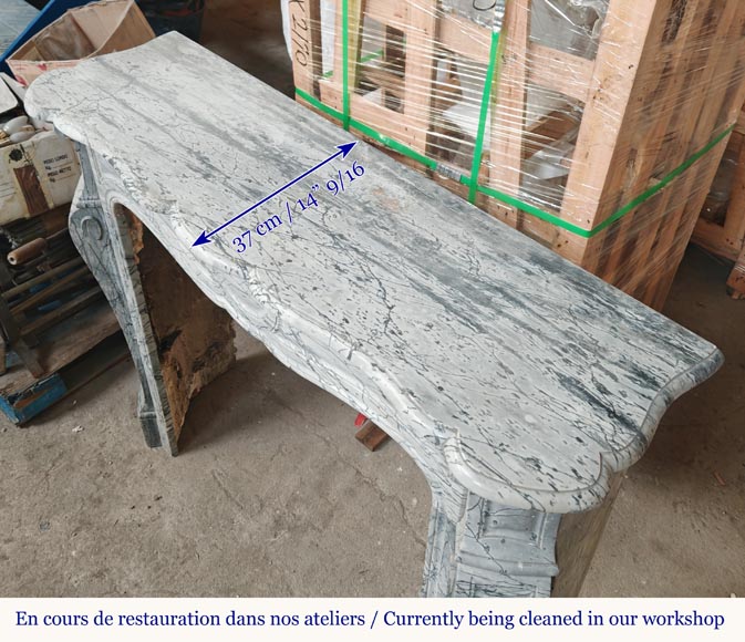 Cheminée de style Louis XV modèle Pompadour en marbre bleu fleuri Cheminée de style Louis XV modèle Pompadour en marbre bleu fleuri-8