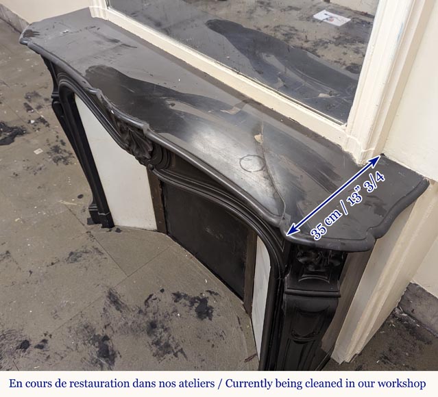 Cheminée de style Louis XV à coquille sculptée en marbre noir fin Cheminée de style Louis XV à coquille sculptée en marbre noir fin-9