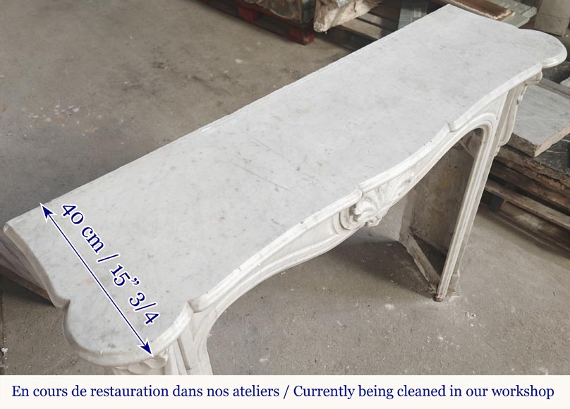 Cheminée style Louis XV en marbre de Carrare décorée d'une coquille Cheminée style Louis XV en marbre de Carrare décorée d'une coquille-7