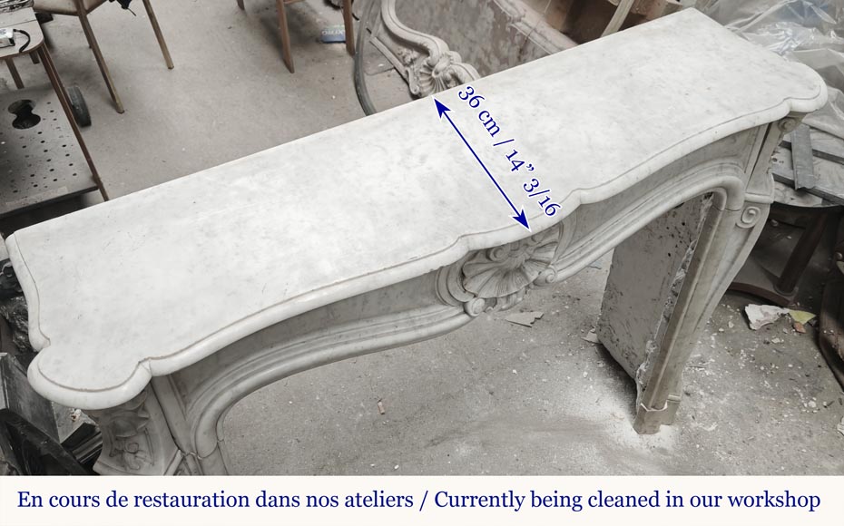 Cheminée style Louis XV en marbre de Carrare décorée d'une coquille Cheminée style Louis XV en marbre de Carrare décorée d'une coquille-9