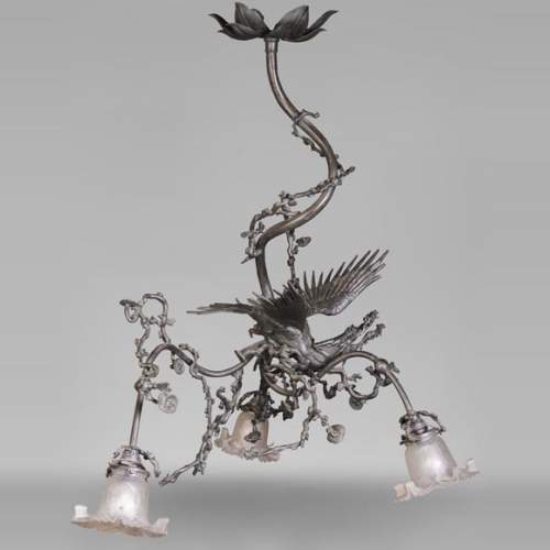 Ancienne paire d'embrases en fer forgé XIXe siècle fleurs de lys stylisés 