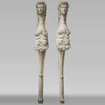 Paire de cariatides engainées en bois sculpté et peint du XVIIIè siècle