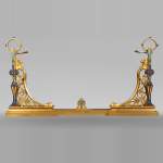 Paire de chenets de style Napoléon III en bronze doré au décors émaillé