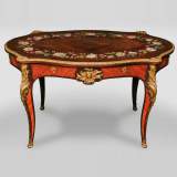 Julien-Nicolas RIVART (1802-1867) - Table en bois de rose de style Louis XV à décor de couronne de pivoines en marqueterie de porcelaine 