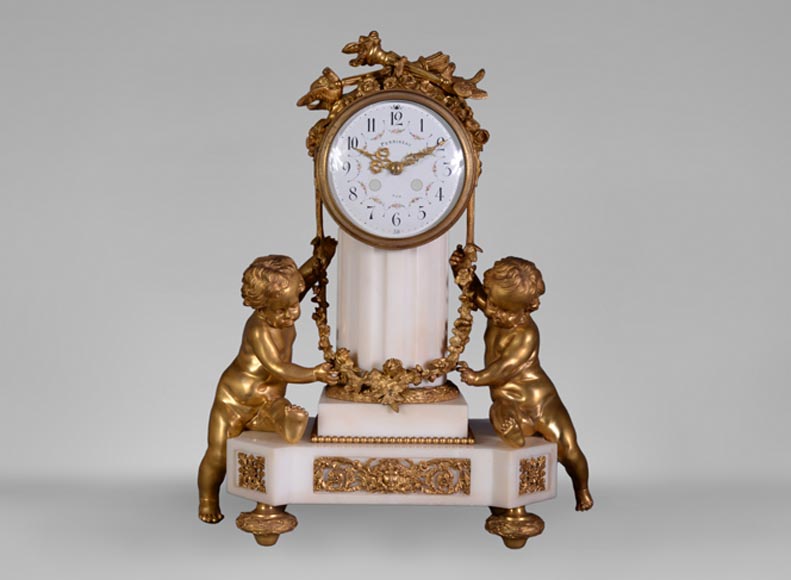 Petite pendule aux putti de Perrineau, de style Louis XVI-0