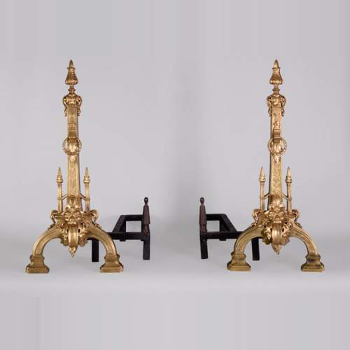 Paire de chenets ancienne de style Napoléon III en bronze doré aux têtes de lions 