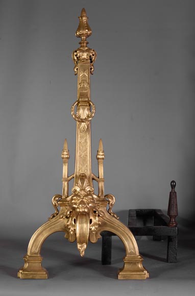 Paire de chenets ancienne de style Napoléon III en bronze doré aux têtes de lions -1