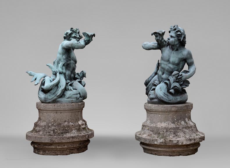 Important Louis XIV style pair of Tritons sounding a conch shell in bronze with green patina_fr