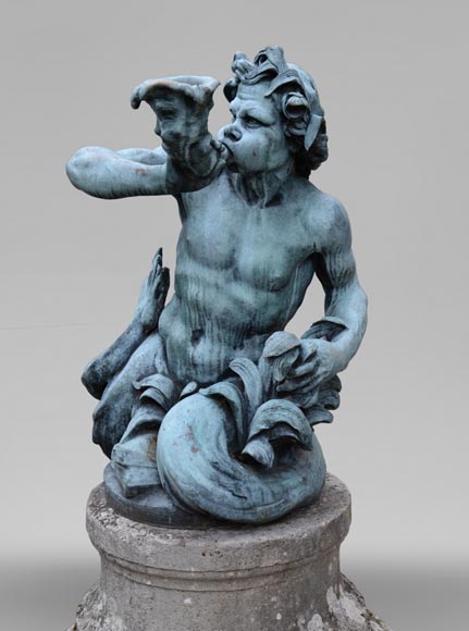 Important Louis XIV style pair of Tritons sounding a conch shell in bronze with green patina_fr