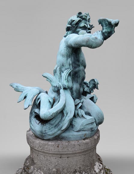 Important Louis XIV style pair of Tritons sounding a conch shell in bronze with green patina_fr